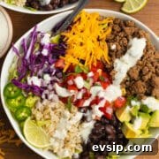 This is a square picture of a beef taco bowl.