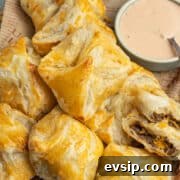 This is a square picture of the cheeseburger puff pastry bites.