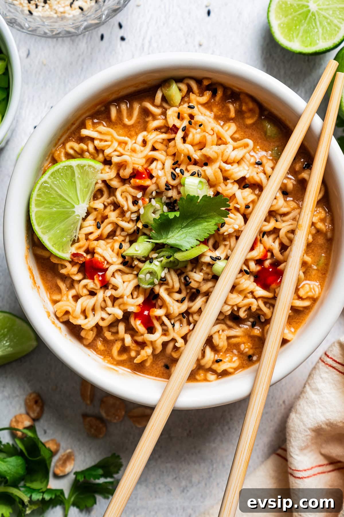Overhead shot of ramen served in a bowl with chopsticks set on top of the bowl.