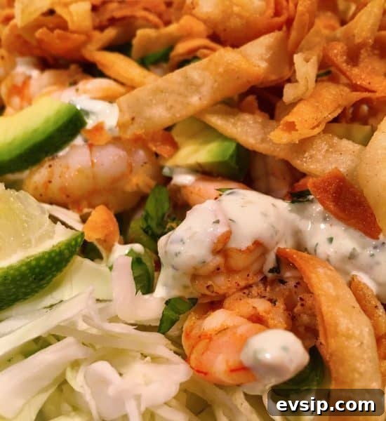 Shrimp Taco Salad with fresh lime cilantro creme dressing 