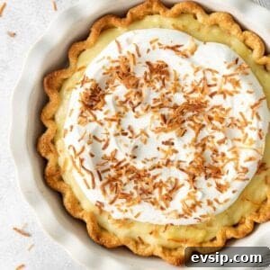 A closeup of coconut cream pie in a dish