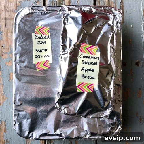 aluminum foil wrapped pans with yellow labels affixed by colorful washi tape.