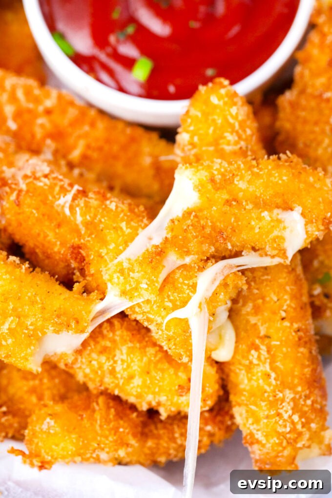 Cheesy and crispy fried cheese sticks.