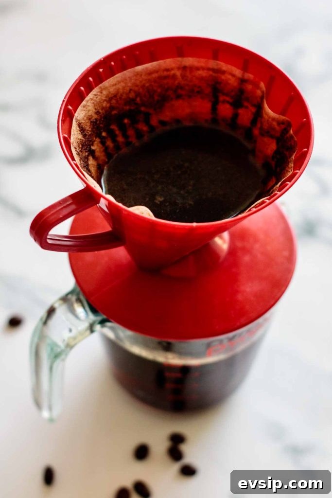 Cold Brew Coffee Concentrate: Ratios, Methods & Pro Tips 12 brewing the recipe with coffee dripper and filter