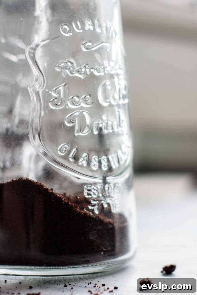 Cold Brew Coffee Concentrate: Ratios, Methods & Pro Tips 10 mixing the ingredients in a jar
