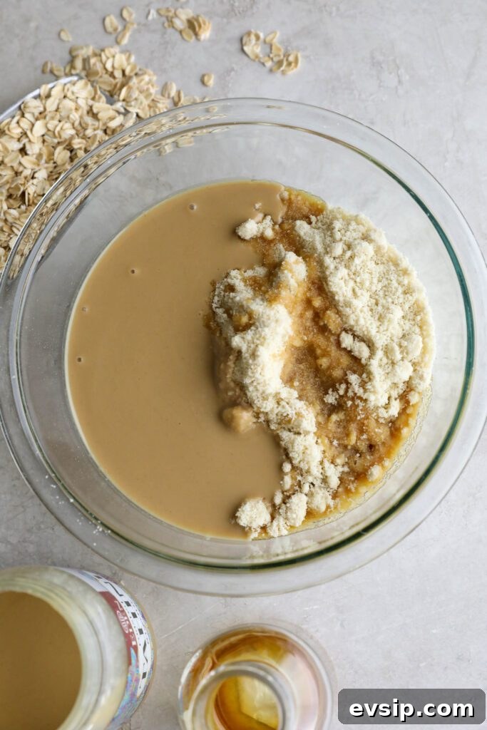 Apple Cherry Tahini Crumble Recipe — Rustic Fruit Dessert 7 Apple Cherry Tahini Crumble mixed in glass bowl