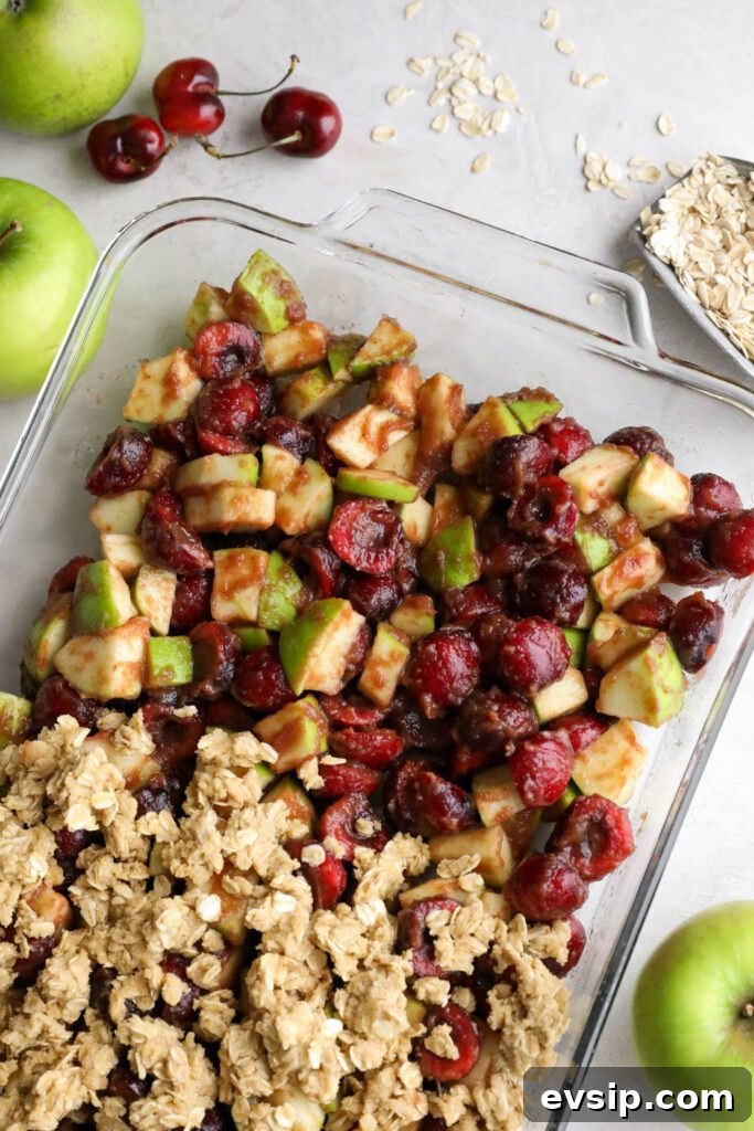 Apple Cherry Tahini Crumble Recipe — Rustic Fruit Dessert 9 Apple Cherry Tahini Crumble assembled in glass baking dish