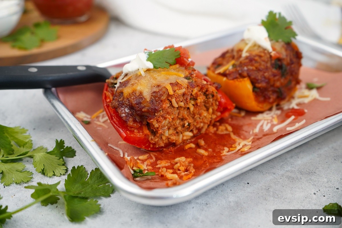 Smoked stuffed peppers with chorizo and rice cut open. 
