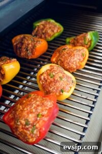 Transfer peppers out to the smoker and place directly on grates