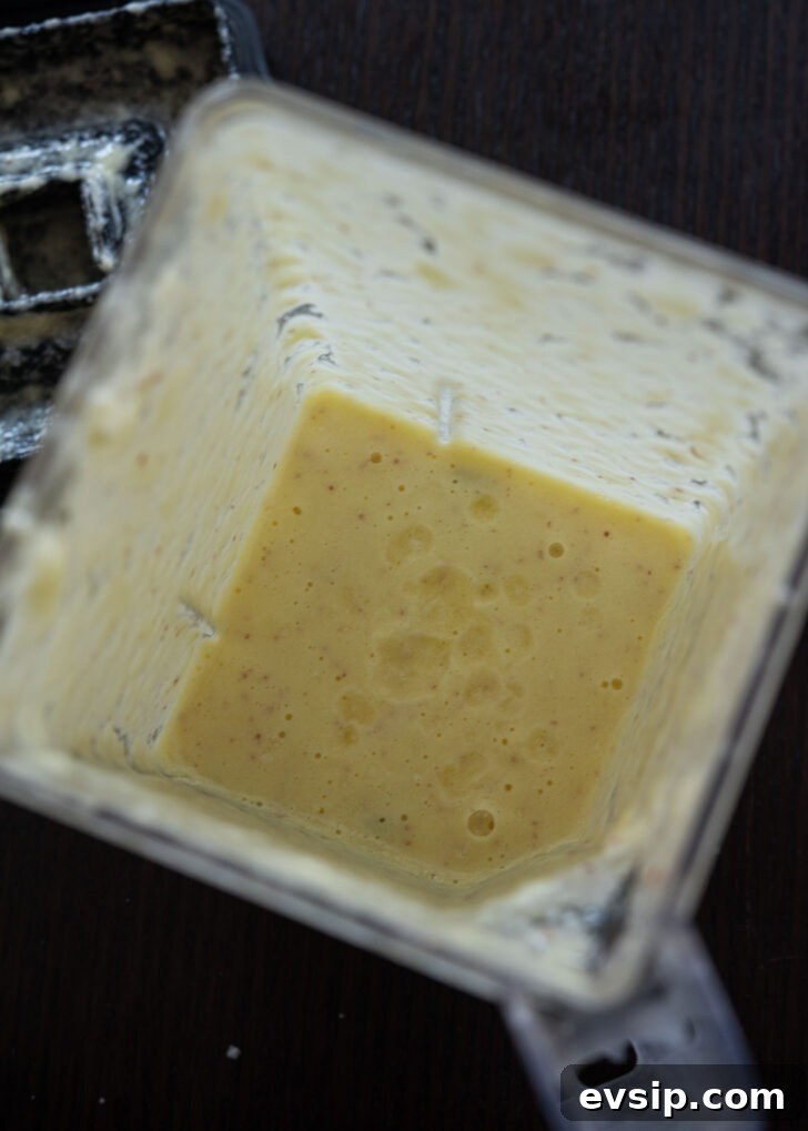 Naengmyeon sauce ingredients blended into a smooth chili base for spicy cold noodles.