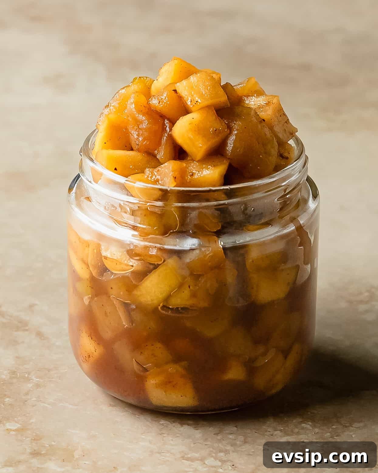 Apple compote is a quick and easy, sweet and chunky apple sauce made with fresh apples flavored with warming spices, vanilla and maple syrup. This apple compote recipe makes the perfect topping for pancakes, french toast, oatmeal, ice cream and more. 