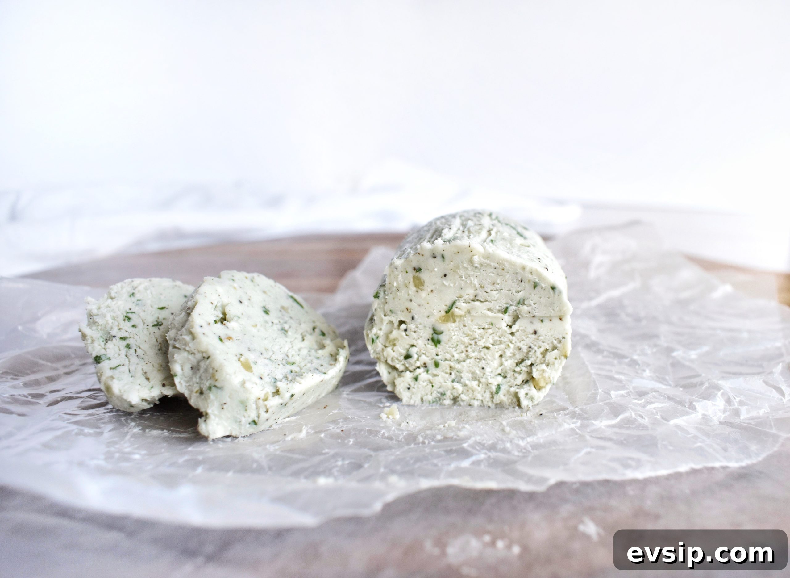 creamy bleu cheese butter perfect for steaks, burger, sandwiches, steamed vegetables, etc bleu cheese butter log with slice