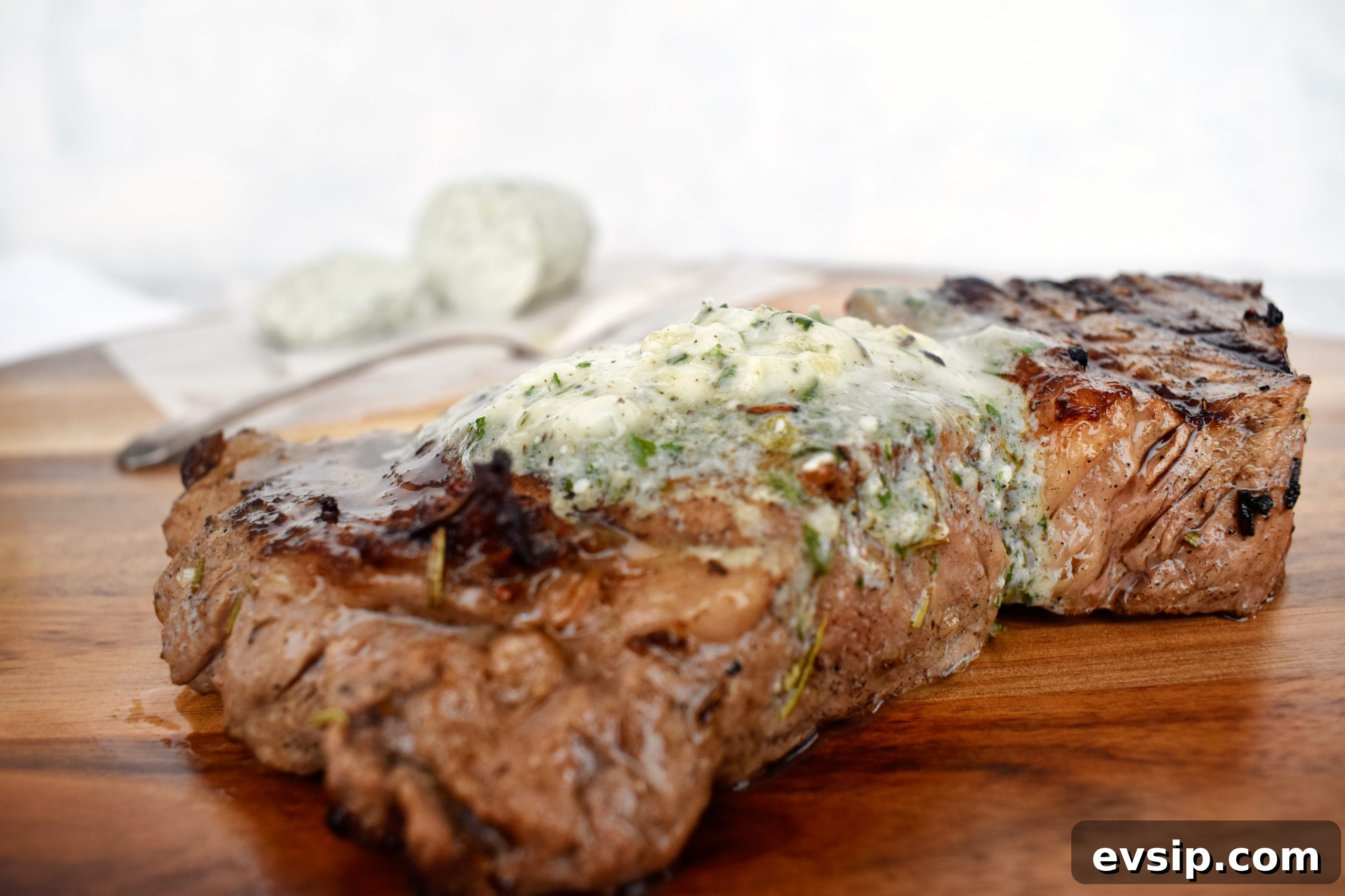 melted compound butter on top of steak melted compound butter on top of steak