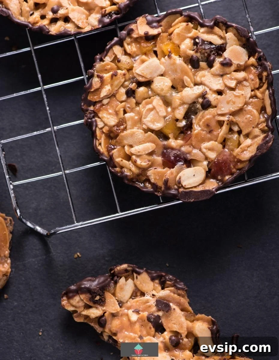 Crisp Florentine Cookies with Chocolate Drizzle Recipe 3 Florentine Cookies coated with chocolate