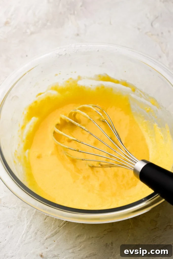 Banana Pudding Cheesecake Recipe with Creamy Layered Filling 15 egg yolks whisked with sugar and cornstarch - smooth