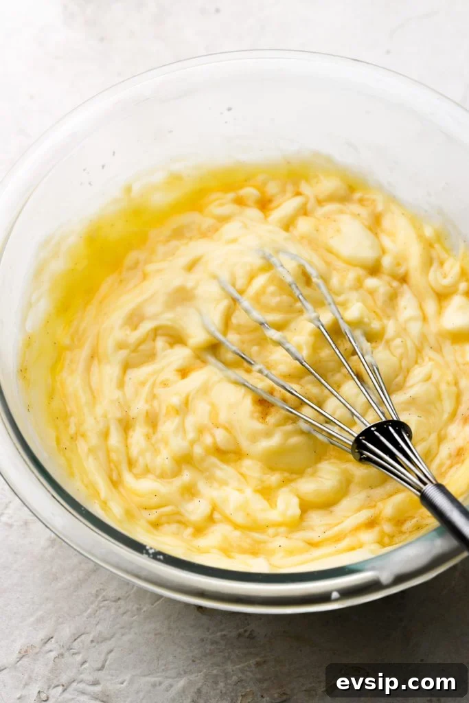 Banana Pudding Cheesecake Recipe with Creamy Layered Filling 18 pastry cream splits when you add butter but comes back together as you whisk it