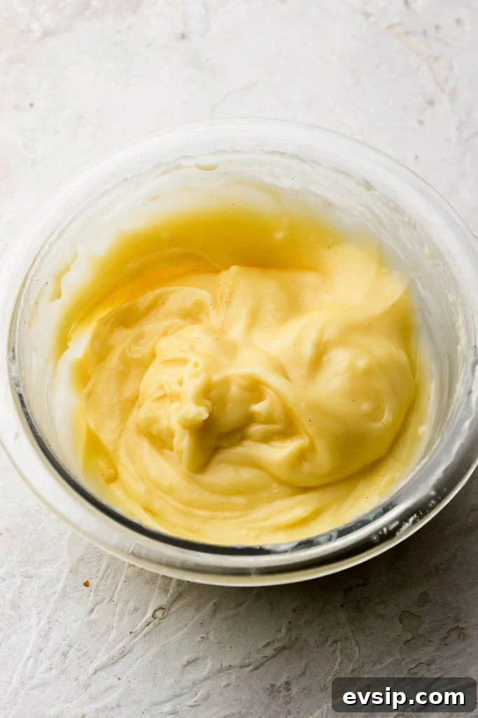 Banana Pudding Cheesecake Recipe with Creamy Layered Filling 19 butter mixed into the cooked pastry cream
