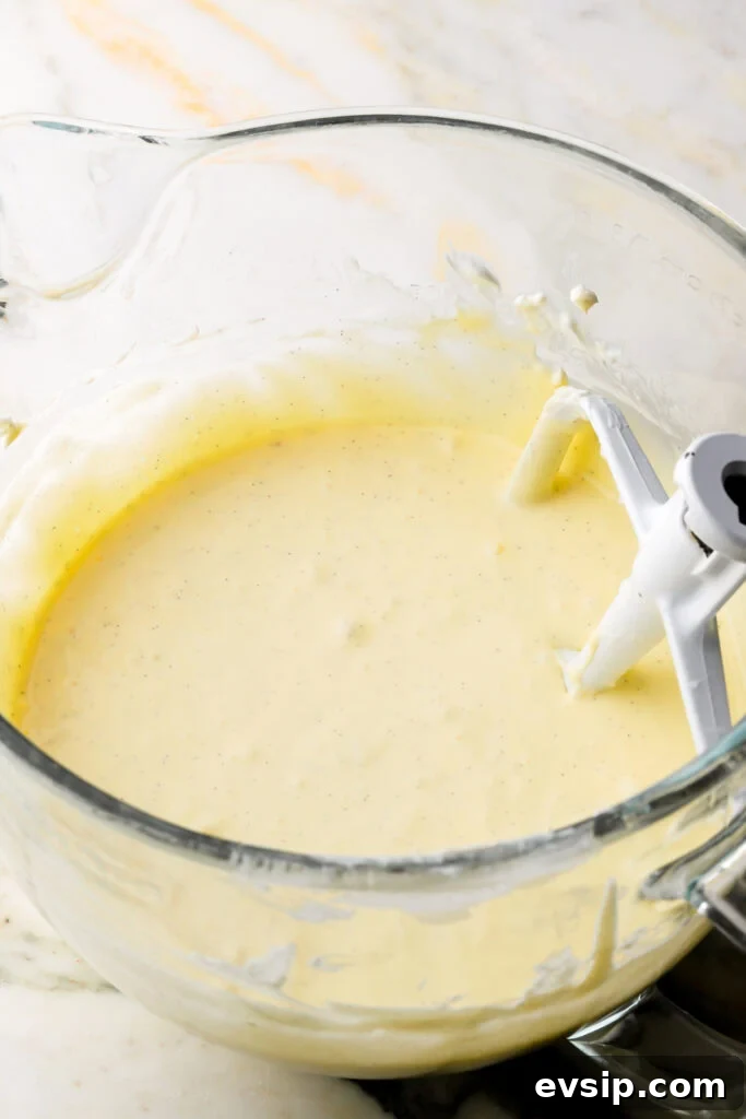 Banana Pudding Cheesecake Recipe with Creamy Layered Filling 8 sour cream, vanilla and eggs mixed into cheesecake batter