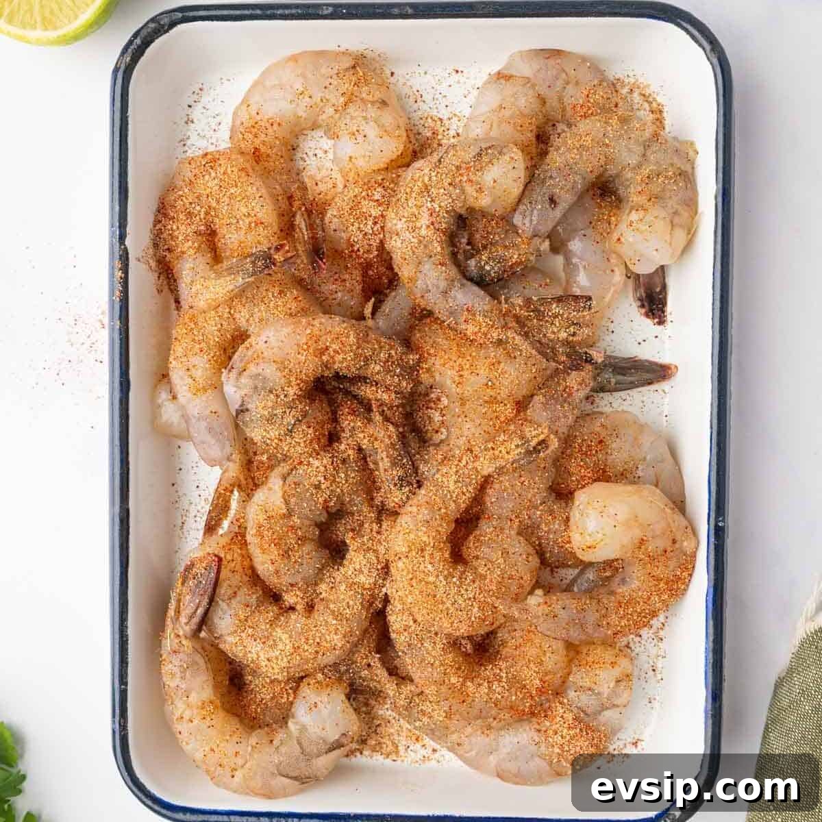 Seasoned shrimp on a platter.