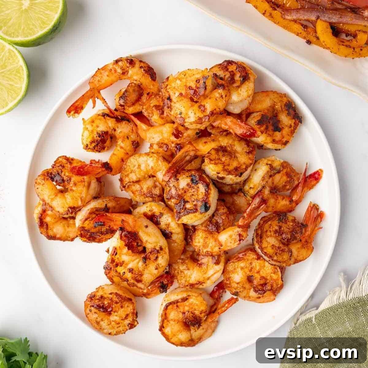 Grilled shrimp on a plate.