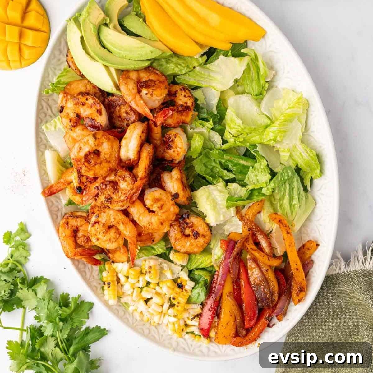 Ingredients for shrimp salad on a platter.