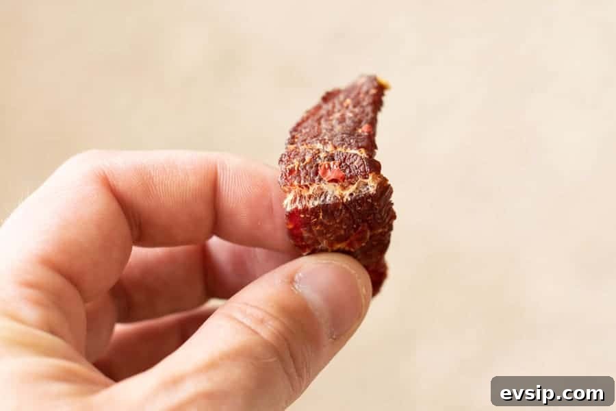 Finished jerky being bent