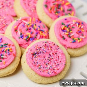Lofthouse Cookie Recipe: Soft Frosted Sugar Cookies Guide 15 Pink frosted Lofthouse Cookies topped with sprinkles.