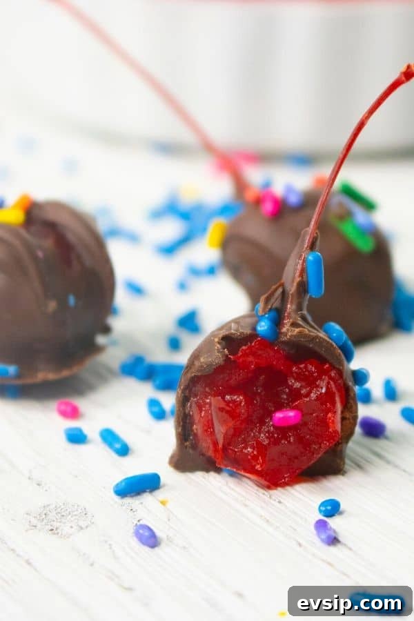 Chocolate-Covered Boozy Cherries Recipe (Video) 2 drunken cherries on plate