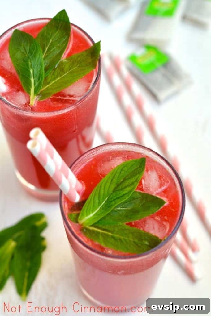 Refreshing Lime Raspberry Iced Tea Recipe You’ll Love 4 Lime Raspberry Iced Tea served in 2 tall glasses with straws and some fresh mint on top