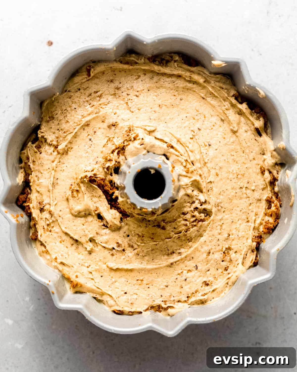 cake batter in a bundt pan.