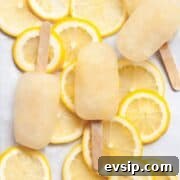 Easy lemonade popsicles recipe made with 3 ingredients and naturally sweetened with honey.