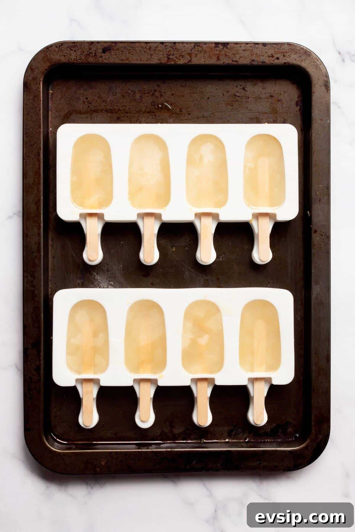 frozen lemonade popsicles in their molds