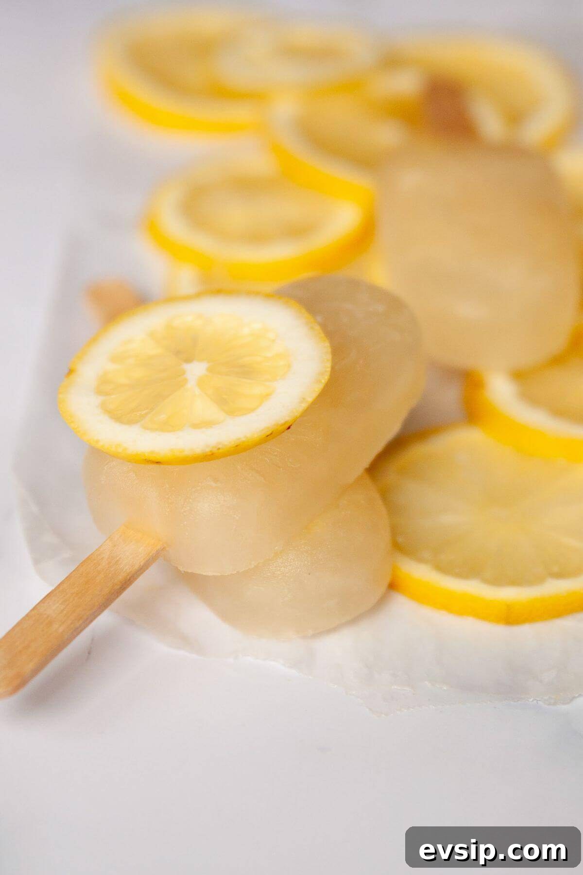 Healthy lemonade popsicle made with fresh lemon juice and honey.