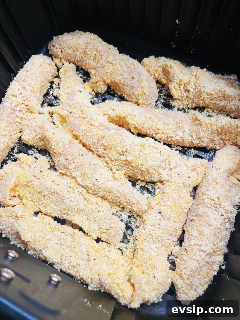 breaded chicken in air fryer before cooking