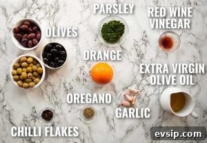 marinated olives ingredients overhead shot of marinated olives ingredients with text labels