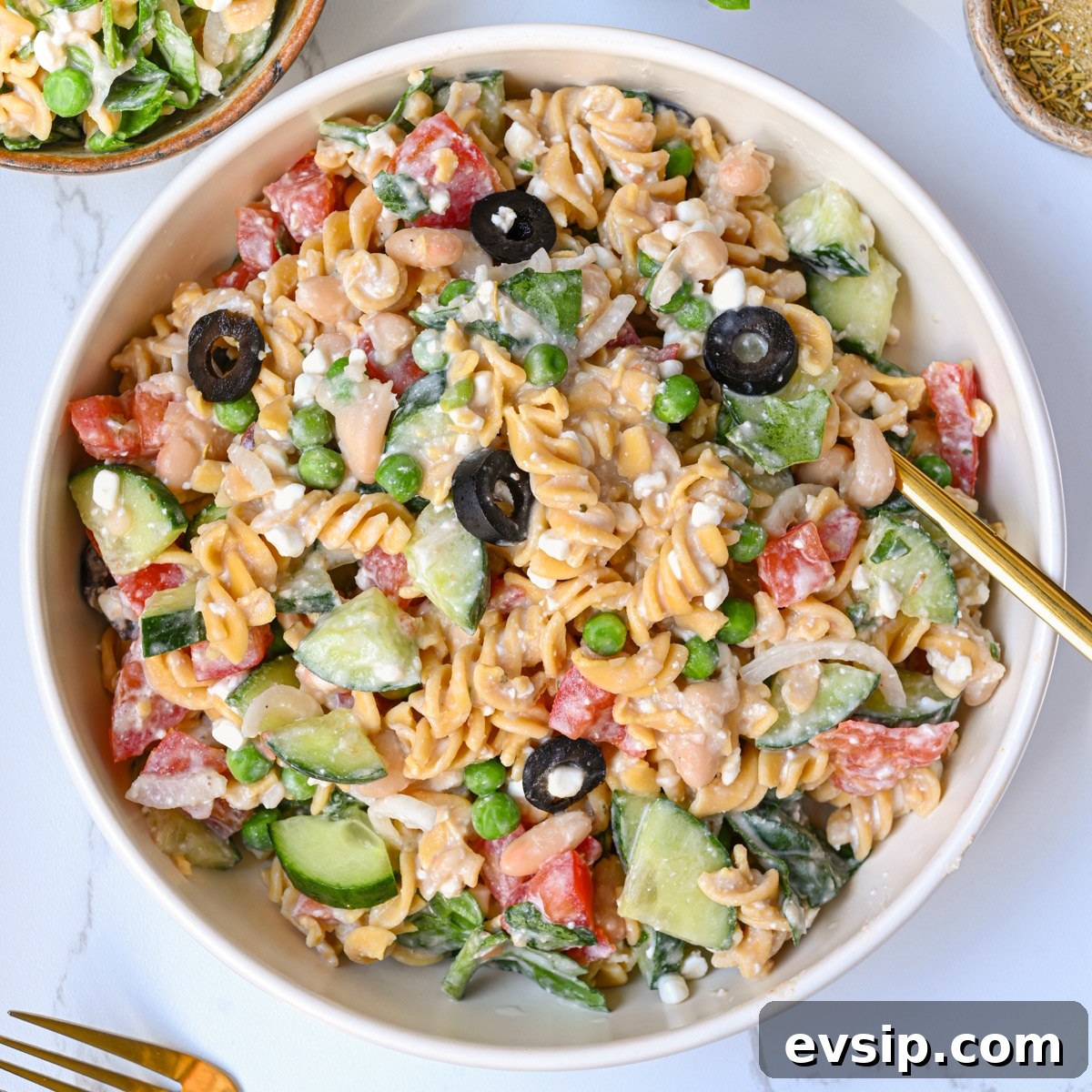 15 Delicious Cottage Cheese Recipes for Every Meal 21 High protein pasta salad in a plate, with vegetables, beans and a creamy dressing. Perfect as a protein-packed lunch recipe using cottage cheese