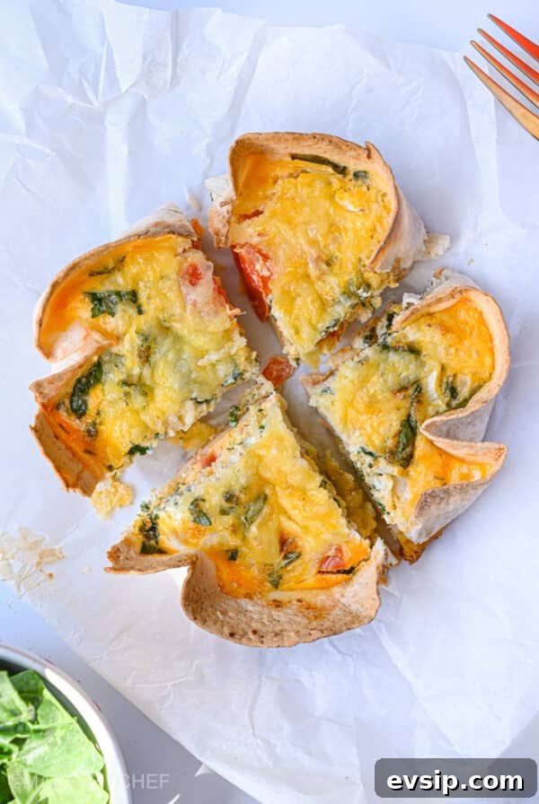 15 Delicious Cottage Cheese Recipes for Every Meal 31 Cottage cheese Tortilla Quiche Bake sliced into quarters, ready to grab and eat as a high protein breakfast or lunch.