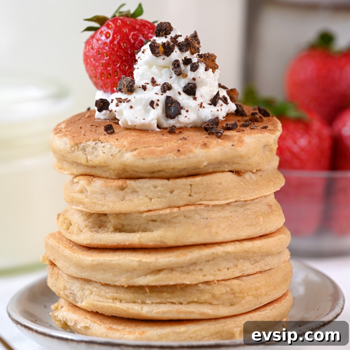15 Delicious Cottage Cheese Recipes for Every Meal 5 Cottage cheese pancakes topped with Greek yogurt, fresh strawberries and cocoa nibs. Perfect as a protein-packed breakfast