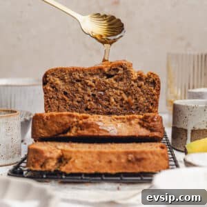 sliced banana bread with honey drizzled on top