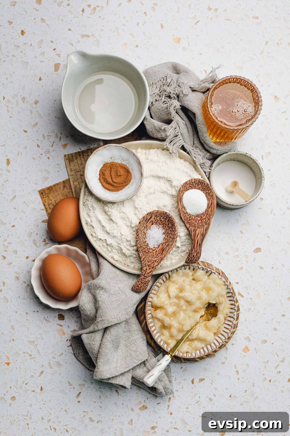 coconut oil, honey, cinnamon, flour, baking powder, baking soda, salt, and mashed banana. 
