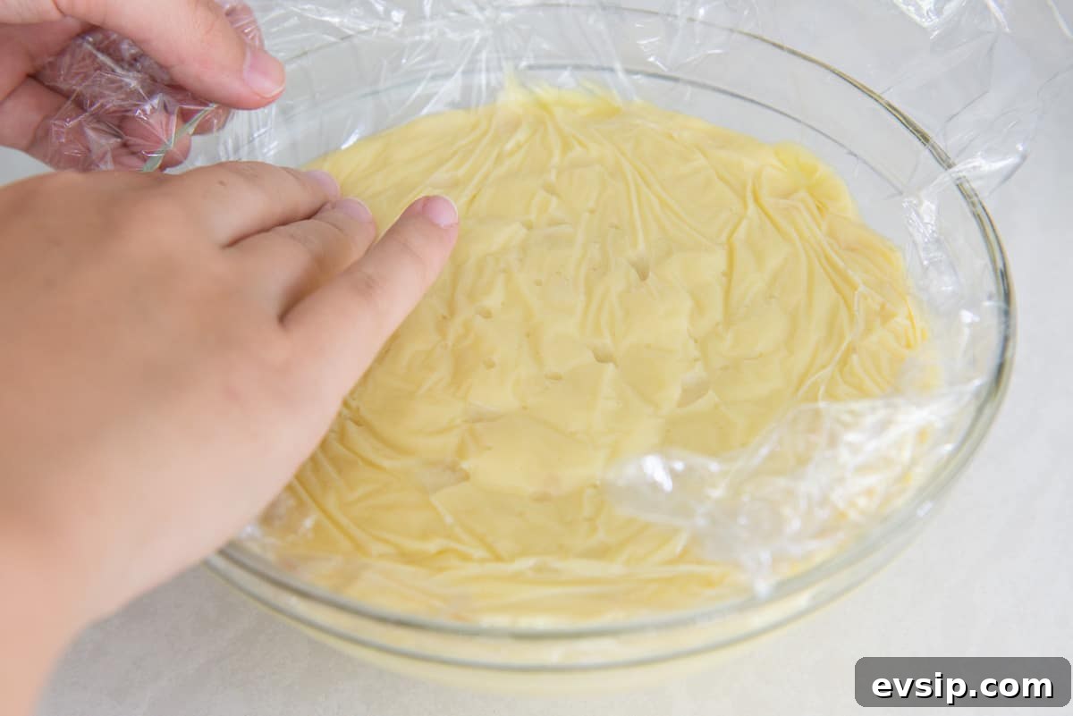 Classic Coconut Cream Pie Recipe: Silky, Homemade Dessert 11 Pressing plastic wrap directly on top of the pudding so a skin doesn't form