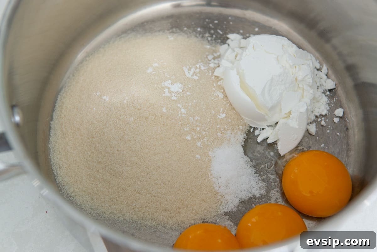 Classic Coconut Cream Pie Recipe: Silky, Homemade Dessert 4 Sugar, cornstarch, salt, and 3 egg yolks in a medium saucepan