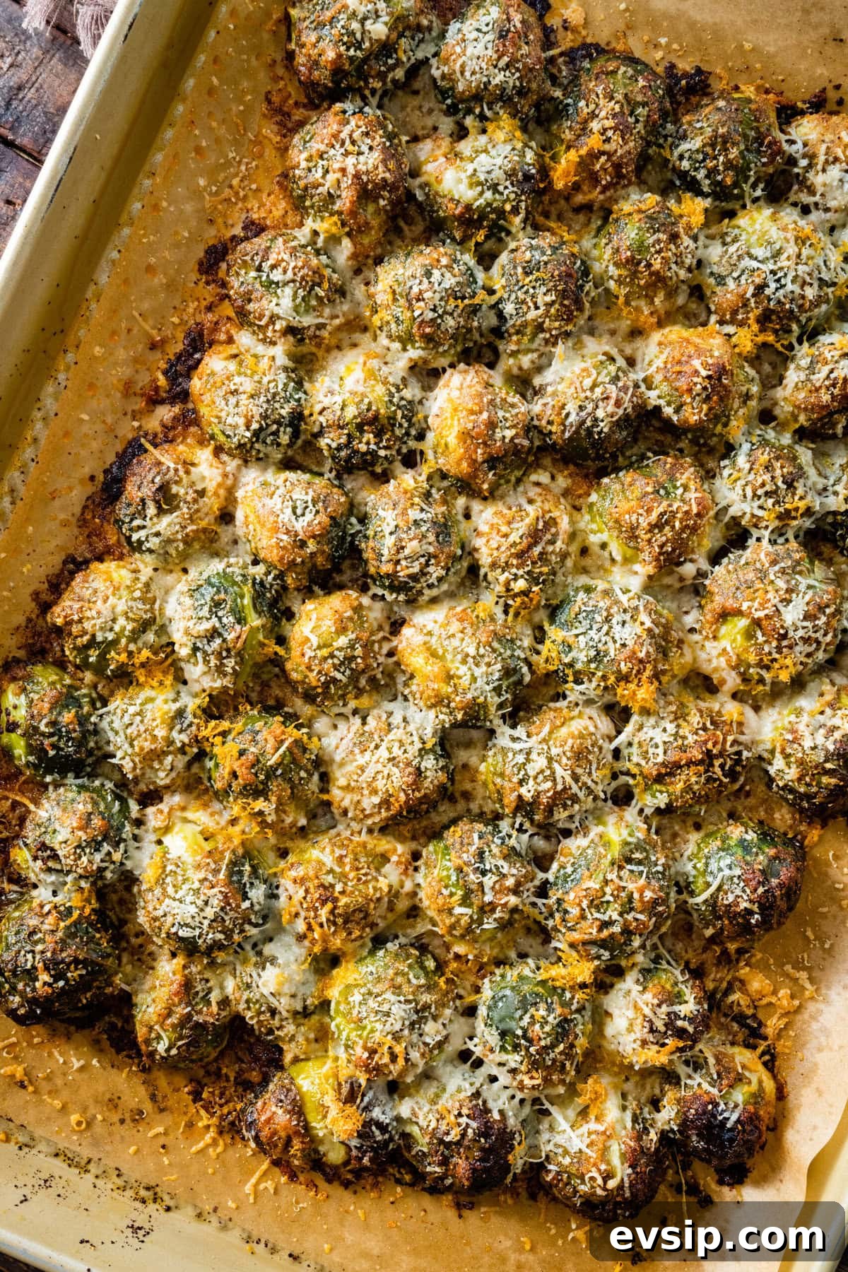 How to make Parmesan Brussels Sprouts Recipe step-by-step with photos: sprouts after they are baked with a cheesy topping.