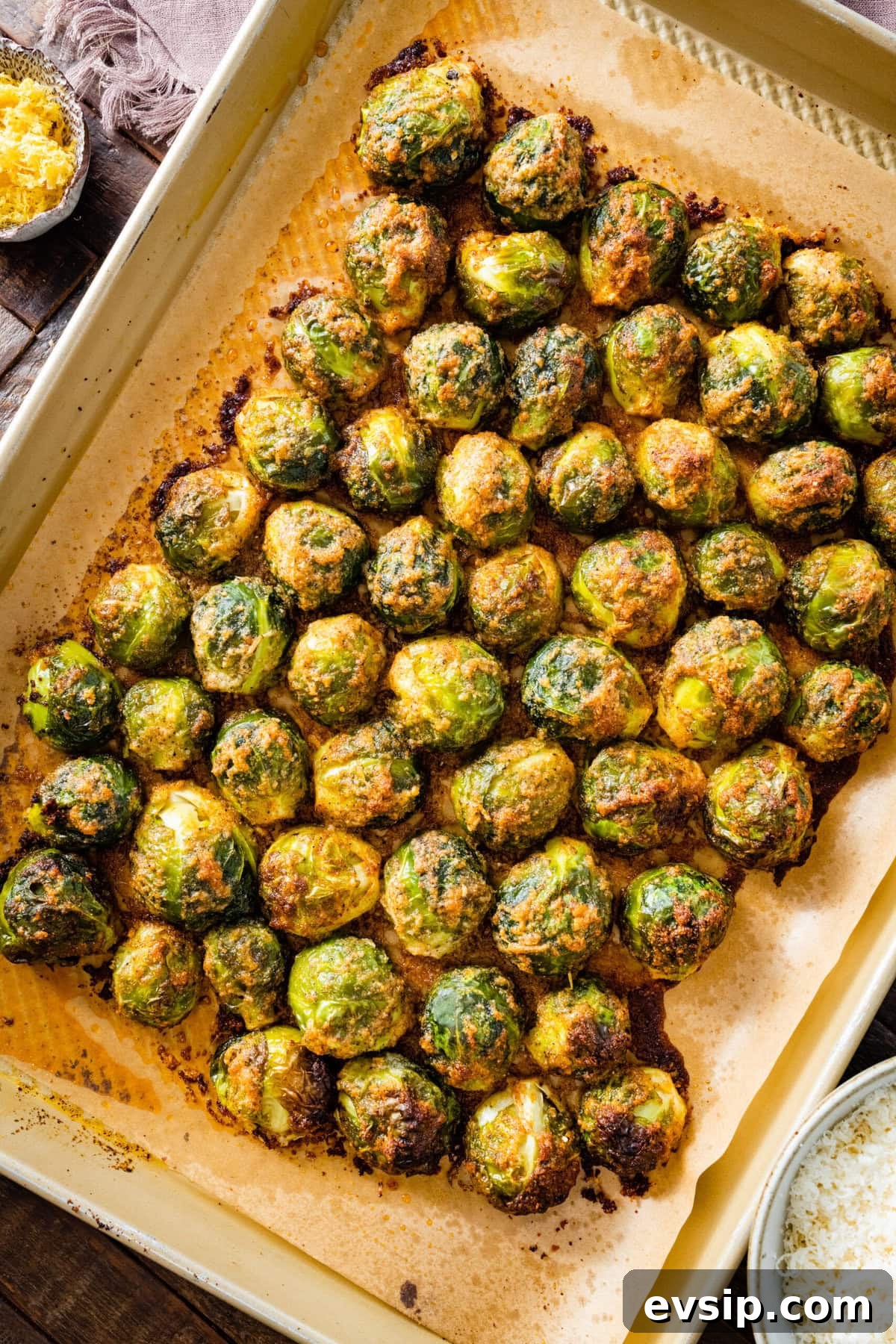 How to make Parmesan Brussels Sprouts Recipe step-by-step with photos: bake for 20 minutes then take out and bake again with cheese on top.