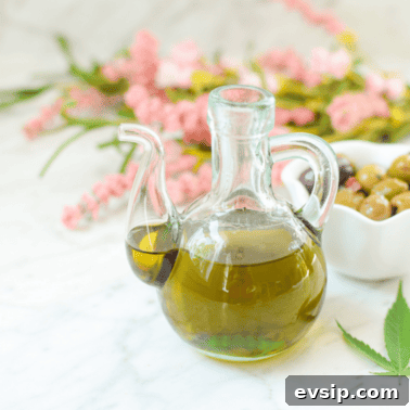 Cannabis Trichomes Explained: How They Affect Potency and Flavor 13 A white counter with a glass jar of cannabis olive oil
