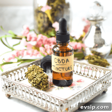 Cannabis Trichomes Explained: How They Affect Potency and Flavor 19 A white countertop with a brown tincture bottle labeled CBDA Tincture