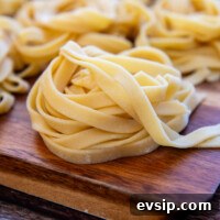 Gluten-Free Pasta folded nested on a cutting board.