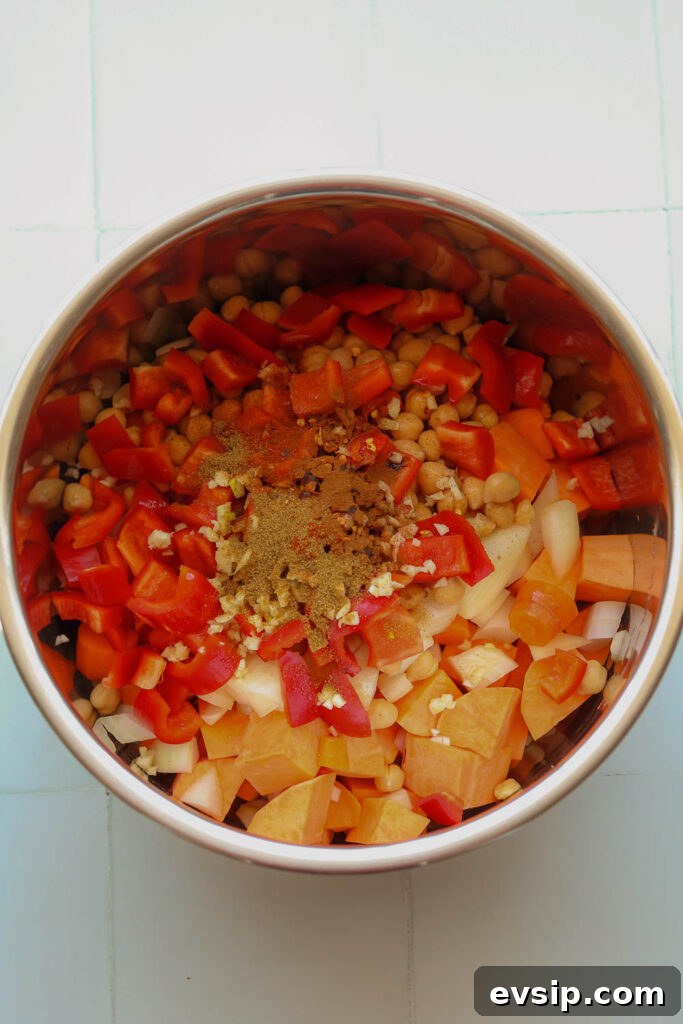 ingredients for spiced sweet potato soup in pressure cooker bowl