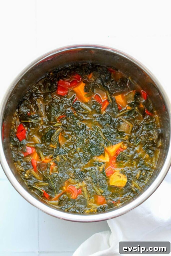 spiced sweet potato and spinach soup after cooking
