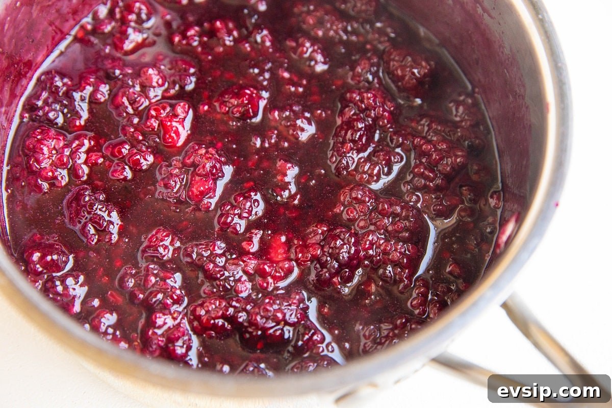 Gluten-Free Vegan Blackberry Pie Bars — 5 Ingredients 8 blackberry jam filling in a saucepan made with fresh blackberries